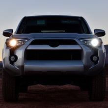 Load image into Gallery viewer, Toyota 4Runner comparison between stock halogen low beam and new LED low beam bulb